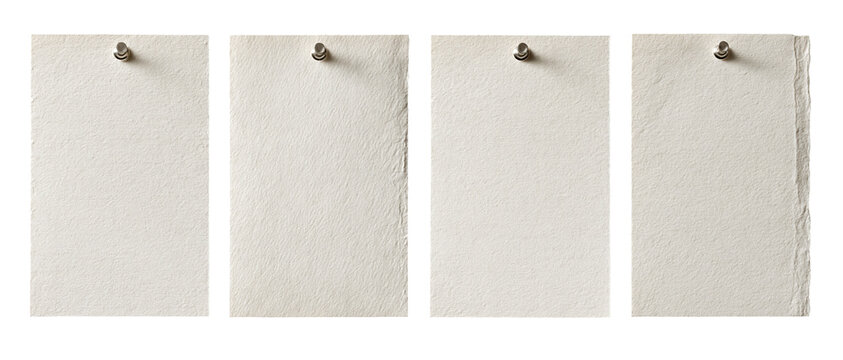 Set of paper labels pinned with small pushpins on transparent