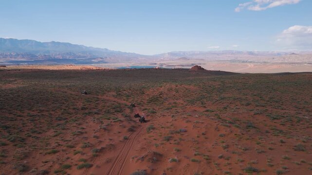 Aerial Drone View of UTVs Speeding Along Open Desert Trails in Utah
