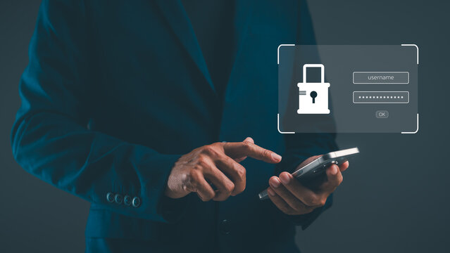 A person in a dark suit uses a smartphone with a digital login interface, emphasizing cybersecurity and secure access to accounts.
