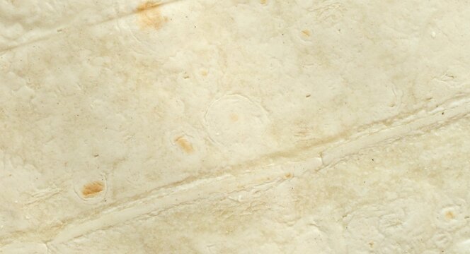 Detailed view on pita bread texture background. Armenian pita bread unleavened flat bread