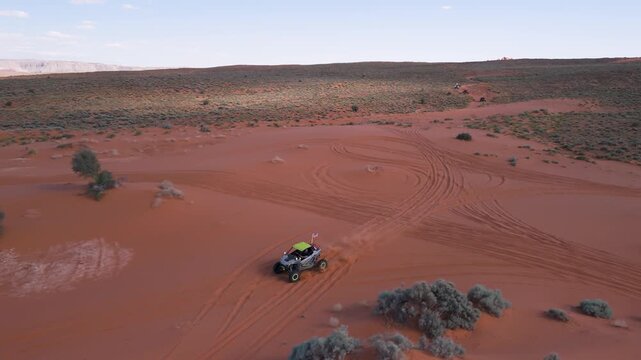 Aerial Drone View of UTVs Speeding Along Open Desert Trails in Utah