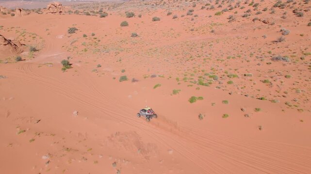 Aerial Drone View of UTVs Speeding Along Open Desert Trails in Utah