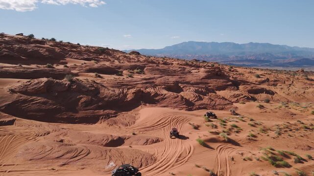 Aerial Drone View of UTVs Speeding Along Open Desert Trails in Utah