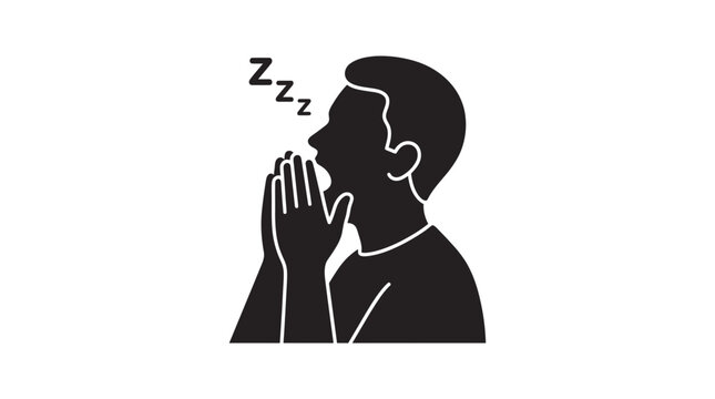 Man yawning with hand covering mouth.