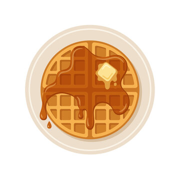 A delicious waffle with syrup and butter on a plate