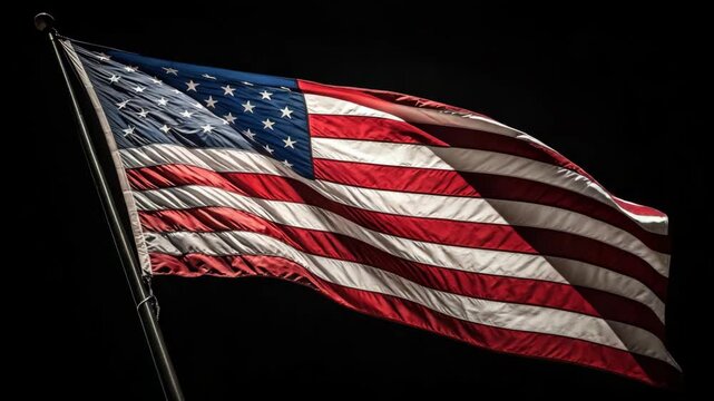 American flag waving gently in darkness with subtle motion blur cinematic