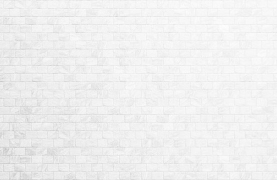Kitchen wallpaper concept: Close up modern white brick tiles wall texture background, White brick wall texture background for stone tile block in grey light color wallpaper modern interior.