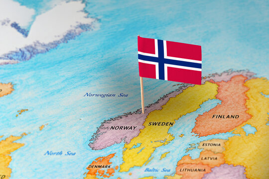 Norway flag pin marking Norway on Europe map, travel destination concept