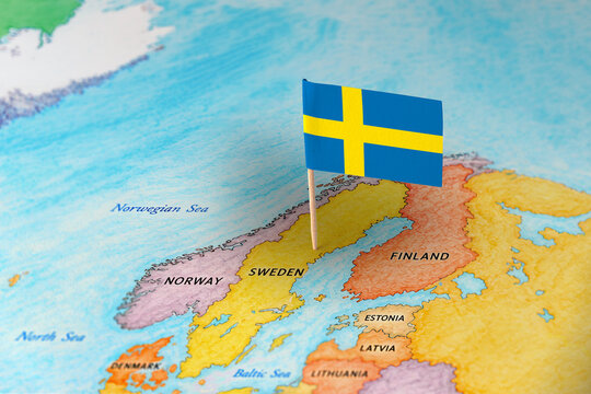 Sweden flag pin marking Sweden on Europe map, travel destination concept