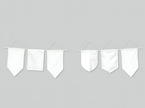 Five white triangular flags hanging on a white string against a gray background