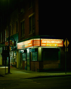 Juan Deli Mini Market vintage sign at night, Holyoke, Massachusetts