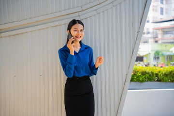 Fototapeta premium Asian businesswoman was happy because she had been promoted