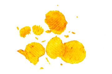 Naklejka premium potato chips and crumbs float dynamically against a clean white background.