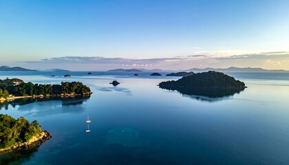 Obraz premium Serene Islands in Calm Water Landscape.