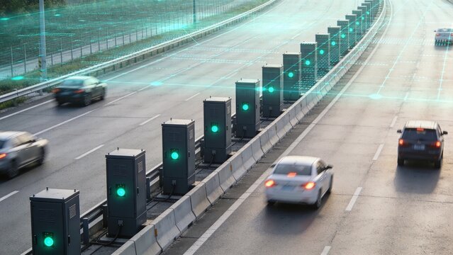 Smart Highway Systems: Cars drive on a highway with advanced technology like smart traffic lights and sensors, creating a futuristic and efficient transportation network.