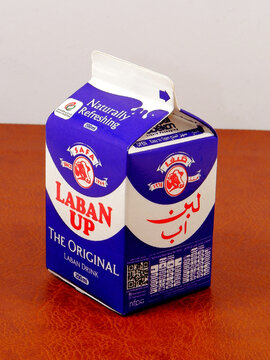 A close-up studio shot of safa Laban Up carton with text in English and Arabic, suggesting a refreshing beverage.
