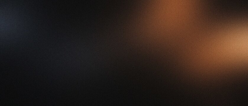 Dark textured background with warm light gradient for abstract design and branding concepts