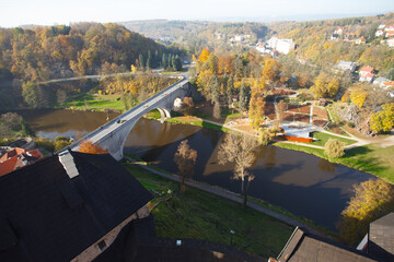 Naklejka premium Loket Castle on rocky hill above Ohre River in Loket, Czech Republic, autumn landscape. g.