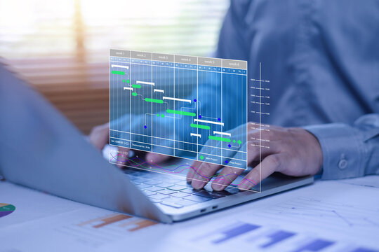 Project management dashboard displayed on a laptop, featuring Gantt chart scheduling, task tracking, workflow planning, team collaboration, timeline management, productivity monitoring, business opera