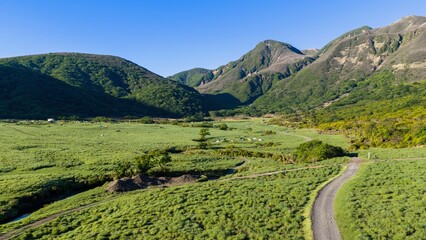 初夏の久住高原 ミヤマキリシマ群生地の空撮風景 © landscape photo
