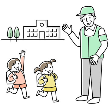 小学校の登下校の見守りをするシニア男性