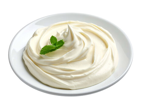 A clean white bowl generously filled with smooth whipped cream swirl topped with a single fresh green mint leaf