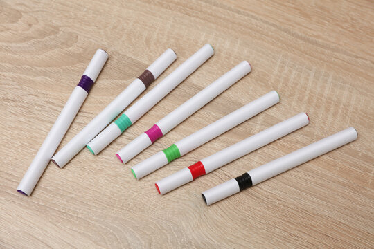 Set of colored felt-tip pens with white blank body on the table