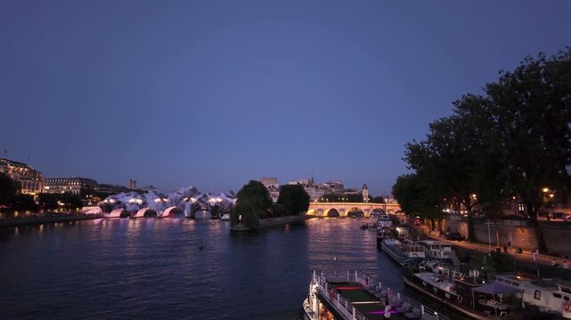 Pont Neuf covered by temporary art installation above Seine in Paris