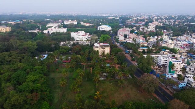 Hotel Casa Meridian with Bhudevi farm, buildings and mangalore to mysore highway at Mysuru, karnataka, india. day time, push in shot, drone shot, 4k.