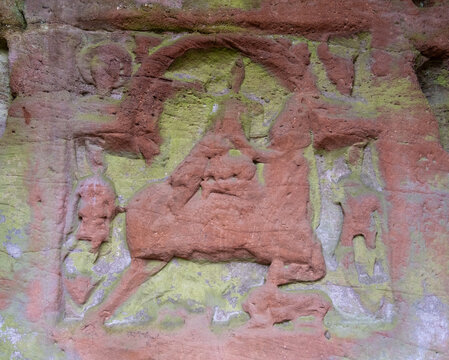 Mithras tauroctony sandstone relief with lichen, Freisen Germany