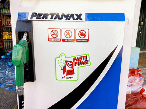 Yogyakarta Indonesia- June 11 2026: Pertamini fuel dispenser with Pertamax branding at a local roadside fuel station in Indonesia. Alternative fuel retail service for motorcycles and vehicles.