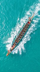 Obraz premium Dragon Boat Race on Turquoise Water, Aerial View of Team Paddling in Competition