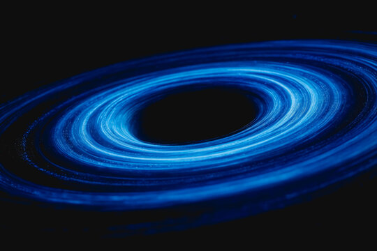 A luminous blue concentric ring structure set against the dark void of deep space, representing a cosmic astronomical phenomenon.