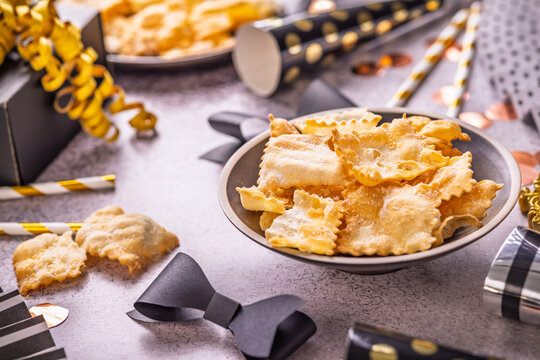 Carnival or party decorations with Chiacchiere as party food