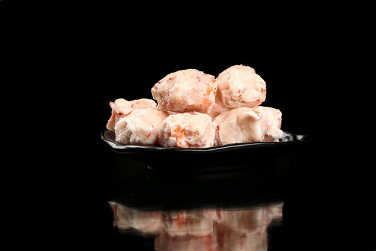 Fresh Teochew Shrimp Roe Balls on Black Plate
