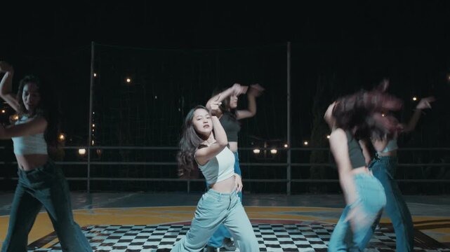 Dance Squad Performing Choreography with Pointing Gesture