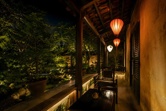 Hoi An Boutique Resort Veranda at Night Overlooking Illuminated Courtyard