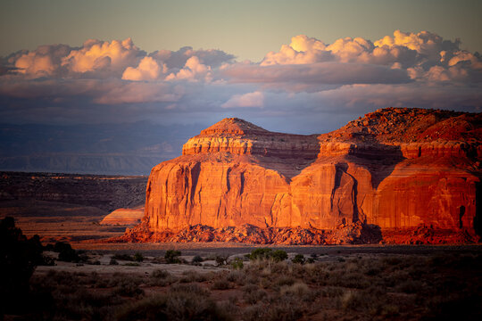 Red rock desert mesa glowing at sunset