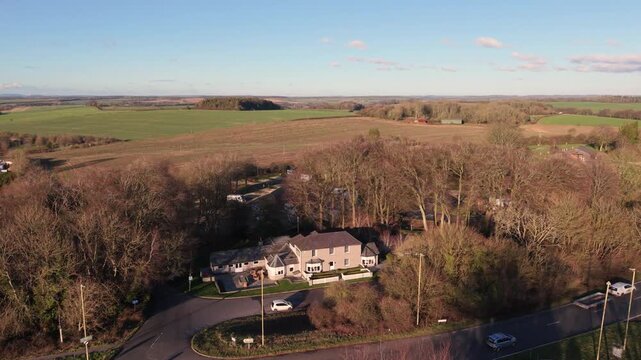 Mornhill Winchester Caravan and Motorhome Club Campsite.Flight over entrance showing Neptune Home,Percy Hobbs roundabout and the setting of the site in rolling Southdowns&rsquo; countryside