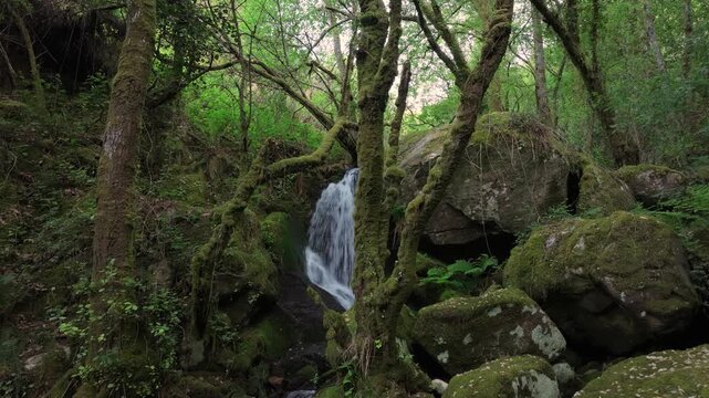 Santo Estevo do Ermo Waterfalls In Tropical Forest In Barreiros, Galicia, Spain. Sideways Shot