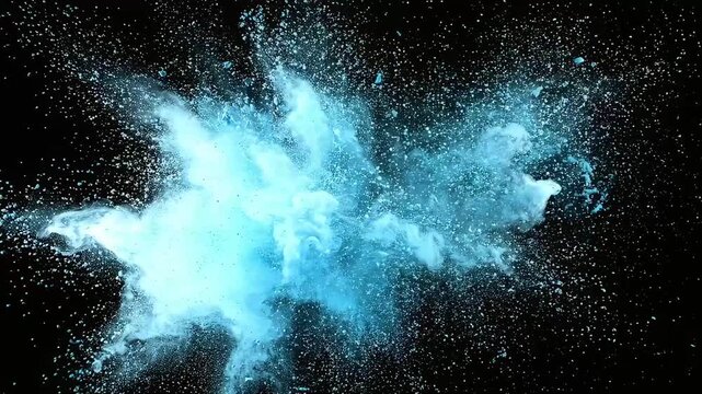 A dynamic explosion of blue colored powder spreads outwards from the center in all directions.