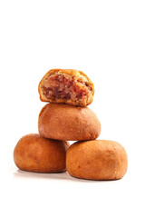 Fototapeta premium Handmade Yunnan Xuanwei Autumn Pastries with Red Filling Stack