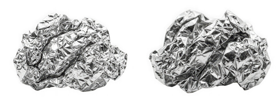Two chunks of crumpled metallic aluminum foil as isolated on transparent background