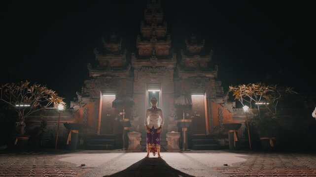 Majestic Night Portrait of Man in Balinese Temple