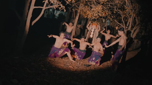 Group of Men Posing with Rangda in Forest