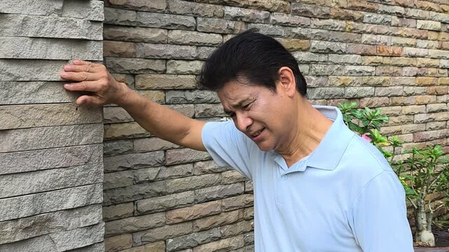 Pessimistic Asian old senior man thinking seriously, planning something with stressed mood and bad feeling