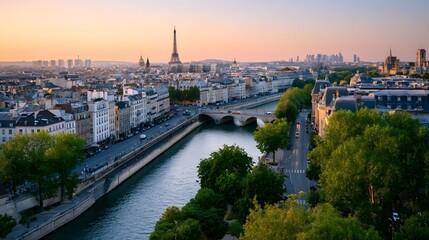 Fototapeta premium A scenic view of a historic European cityscape bathed in the warm glow of a dramatic sunset over a river