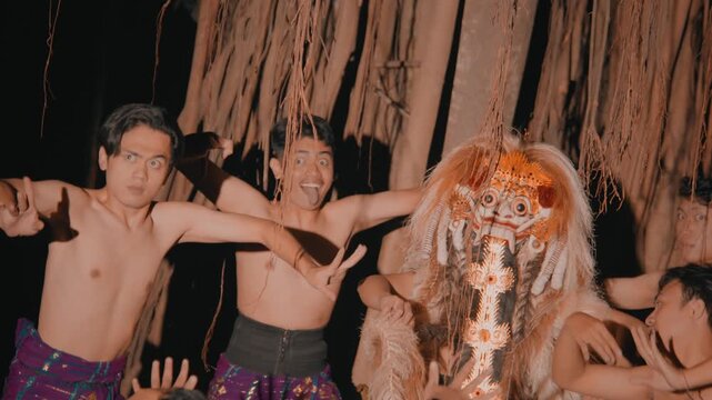 Terrified Expressions of Men with Rangda Demon