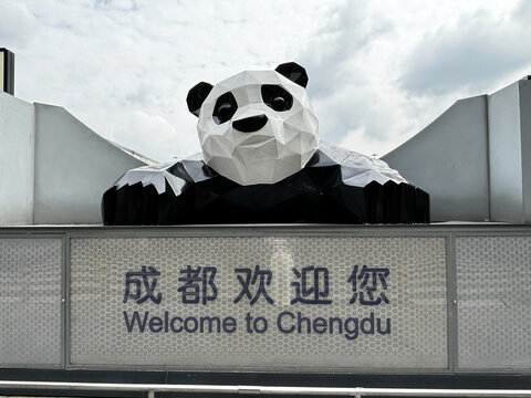 Chengdu, China - November 8, 2025: A panda sculpture with &ldquo;Welcome to Chengdu&rdquo; signage displayed at Chengdu Shuangliu International Airport.