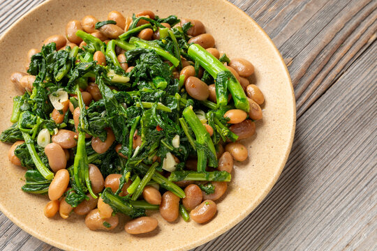 Saut&eacute;ed broccoli rabe with beans. 